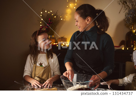 Joyful Mother And Kids Baking Christmas Gingerbread At Cozy Home Kitchen 131434737