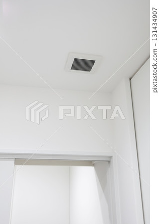 Ventilation opening of a ceiling-mounted ventilation fan Ventilation opening of a ceiling-mounted ventilation fan 131434907