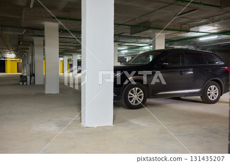 This is a Modern Underground Parking Garage designed specifically for vehicle storage and use 131435207