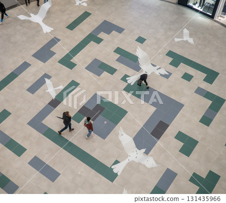 lobby of a new shopping center. Light walls of a shopping center. New Batumi Mall. A place to shop. Modern interior. Part of the interior. View from above 131435966