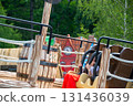 Elementary school playground on a bright day. in playground differs wooden boxes High quality photo 131436039