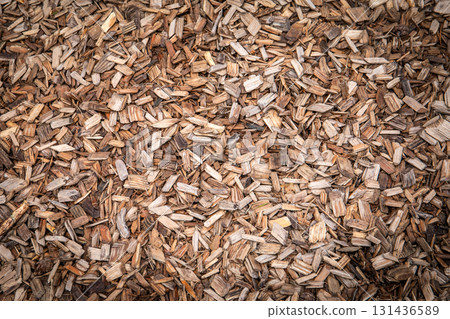 Natural Wood Chip Mulch Background for Landscaping, Gardening, and Organic Texture Concepts Natural Wood Chip Mulch Background for Landscaping, Gardening, and Organic Texture Concepts 131436589