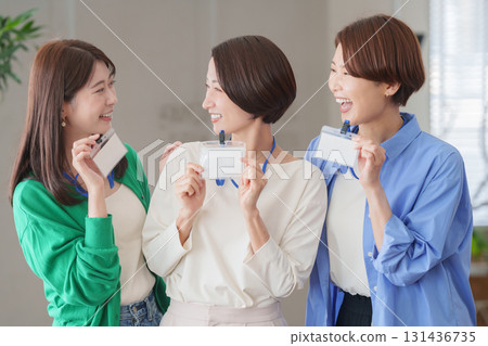 Women working in the office (name holder) Women working in the office (name holder) 131436735
