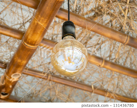 Lighting in a cafe. Interior detail. The lamp does not light up. Lighting device during daylight hours. Lighting in a cafe. Interior detail. The lamp does not light up. Lighting device during daylight hours. 131436780