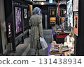 A woman walking in the city 131438934