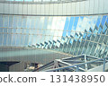 blue sky reflected in the glass 131438950