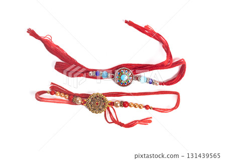 Traditional Indian Rakhi bands with colorful beads on a white background Traditional Indian Rakhi bands with colorful beads on a white background 131439565