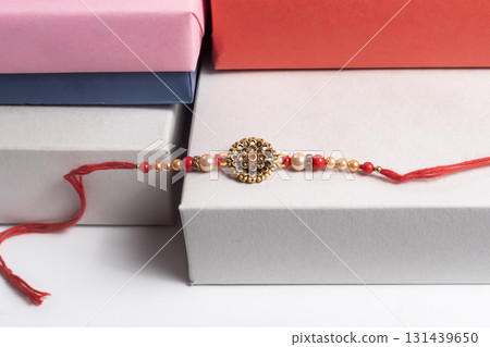 Beautiful Rakhi bangles in boxes symbolizing the bond of love and celebration. 131439650