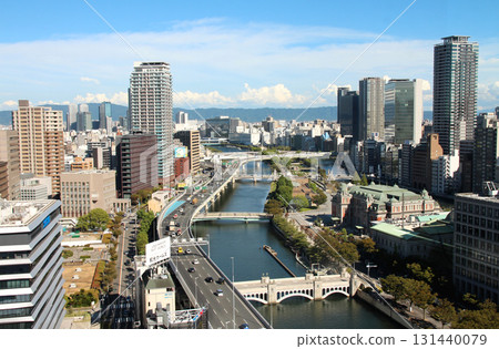 View of the Tosabori River from Yodoyabashi, Osaka City Hall, Nakanoshima Public Hall, and Nakanoshima Library from above 131440079