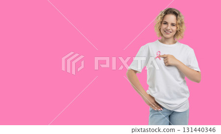 Person showing support for cancer awareness with a smile Person showing support for cancer awareness with a smile 131440346