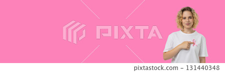 Participants promote cancer awareness with pink ribbons 131440348