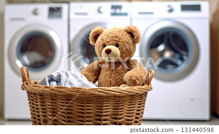 Teddy Bear in Laundry Basket in Laundry Room Teddy Bear in Laundry Basket in Laundry Room 131440598