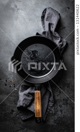Cast Iron Pan on a Black Table 131440622