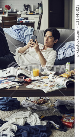 A useless husband who doesn't do any housework even though the room is messy A useless husband who doesn't do any housework even though the room is messy 131440825