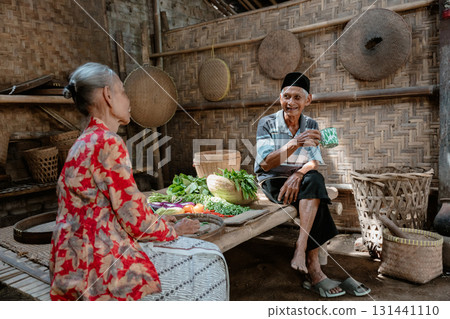 Cultural Exchange Taking Place in a Traditional Market Focused on Fresh Produce Cultural Exchange Taking Place in a Traditional Market Focused on Fresh Produce 131441110