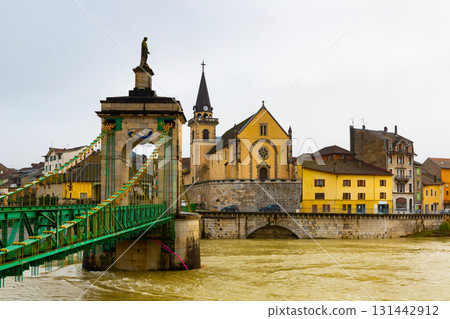 Afternoon view of the town of Seyssel with the flowing Rhone River and a bridge Afternoon view of the town of Seyssel with the flowing Rhone River and a bridge 131442912