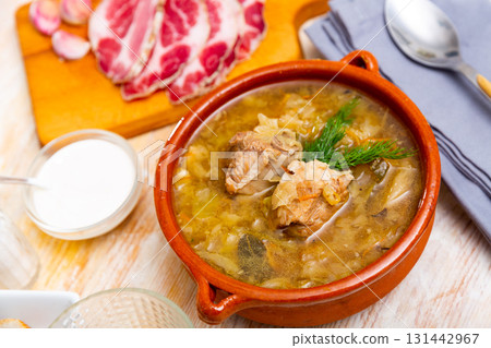 Traditional Russian dish is cabbage soup 131442967