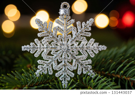 Glitter Snowflake Ornament Hanging On Christmas Tree 131443037