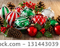 Red And Green Christmas Baubles With Pinecones 131443039