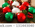 Red And Green Christmas Baubles With Pinecones 131443040