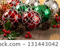 Red And Green Christmas Baubles With Pinecones 131443042