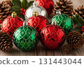 Red And Green Christmas Baubles With Pinecones 131443044