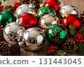 Red And Green Christmas Baubles With Pinecones 131443045