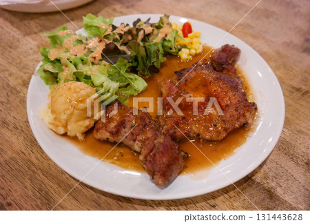 pork steak on plate in restaurant pork steak on plate in restaurant 131443628