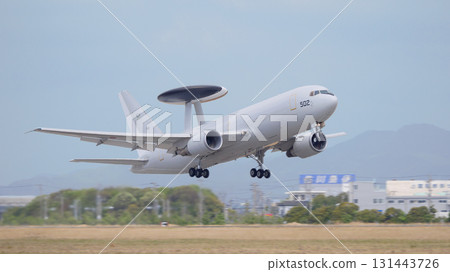 Japan Air Self-Defense Force E-767 early warning and control aircraft takeoff and climb 131443726
