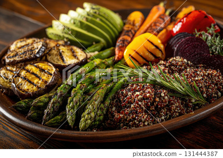 Grilled vegetables and quinoa salad in a wooden serving platter 131444387