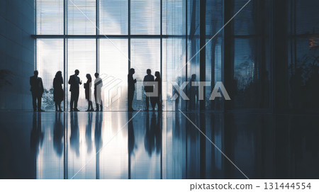 Business people office silhouette meeting teamwork modern glass window corporate professional reflection communication collaboration 131444554