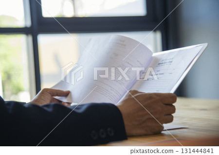 Job HR applicants having an interview with Human resource manager jobs interviewing with confident candidate at business firm office give cv resume. Job Interview with headhunter agent and applicant 131444841