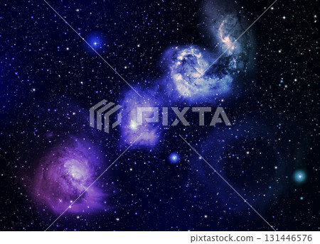 The galaxy in the bluish purple clouds floating above the black background atmosphere 131446576