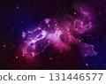 A galaxy in a purple-pink cloud floats above the atmosphere on a black background with sparkling stars. 131446577