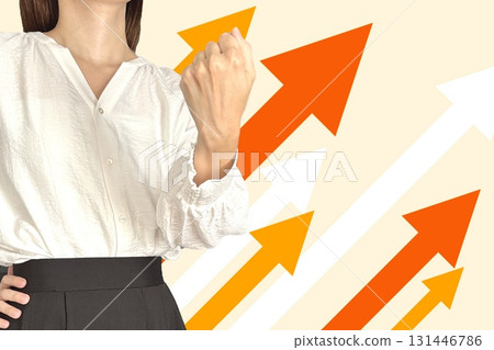 Woman with a fist pump and a rising arrow Woman with a fist pump and a rising arrow 131446786