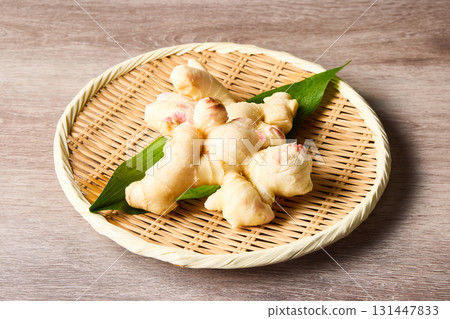 Fresh ginger, Japanese food ingredient on wood grain background 131447833