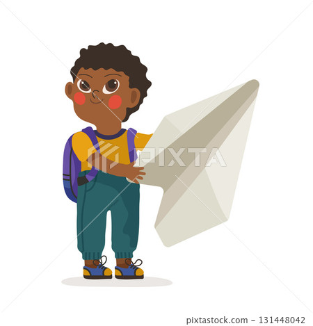 A cute schoolboy holds a paper airplane in his hands. Back to School concept. Preschooler ready for first lesson 131448042