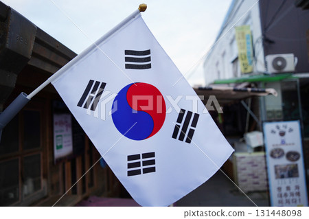 Small Korean National Flag Displayed in a Traditional Market Alley Small Korean National Flag Displayed in a Traditional Market Alley 131448098