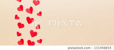 Valentine day background with red hearts, top view with copy space Valentine day background with red hearts, top view with copy space 131448654