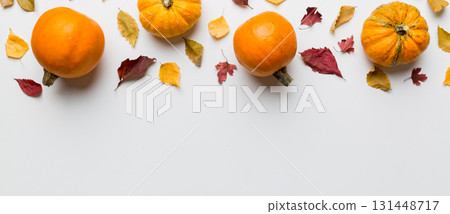 Autumn composition. Pattern made of dried leaves and other design accessories on table. Flat lay, top view 131448717