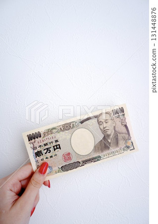 Hand holding banknotes Hand holding banknotes 131448876
