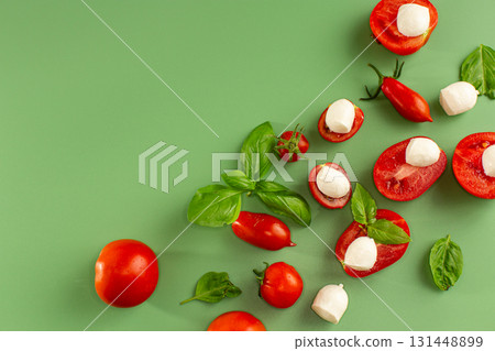 culinary layout with basil tomatoes and mozzarella culinary layout with basil tomatoes and mozzarella 131448899