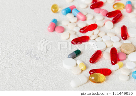 Many different colorful medication and pills perspective view. Set of many pills on colored background 131449030