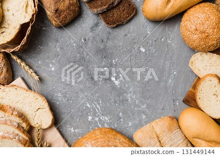 Homemade natural breads. Different kinds of fresh bread as background, top view with copy space 131449144