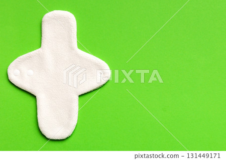 Eco-friendly reusable fabric women's pads. set of colorful bright reusable menstrual pads. zero waste woman periods concept top view with copy space 131449171