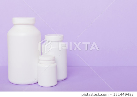 supplement pills with medicine bottle health care and medical top view. Vitamin tablets. Top view mockup bottle for pills and vitamins with green leaves, natural organic bio supplement, copy space supplement pills with medicine bottle health care and medical top view. Vitamin tablets. Top view mockup bottle for pills and vitamins with green leaves, natural organic bio supplement, copy space 131449482