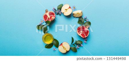 Rosh hashanah concept. Frame made of symbols jewish New Year holiday Traditional. Top view with copy space Rosh hashanah concept. Frame made of symbols jewish New Year holiday Traditional. Top view with copy space 131449498