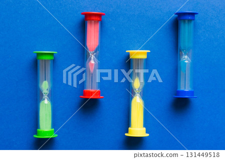 hourglass on the table, sand clock as time passing concept for business deadline, copy space hourglass on the table, sand clock as time passing concept for business deadline, copy space 131449518