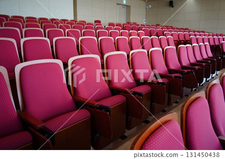 Empty Conference Hall Auditorium with Red Chairs 131450438