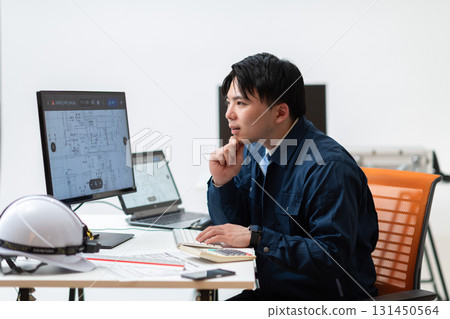 Construction management desk work 131450564